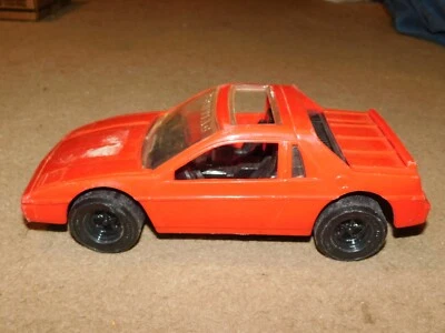Juguete de plástico años 80 Pontiac Fiero 2M4 rojo plástico 10" largo vintage Tootsietoy Foto 1 de 4