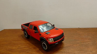 1/24 Ford F150 raptor rouge 2011 Jada Toys - Photo 1/4