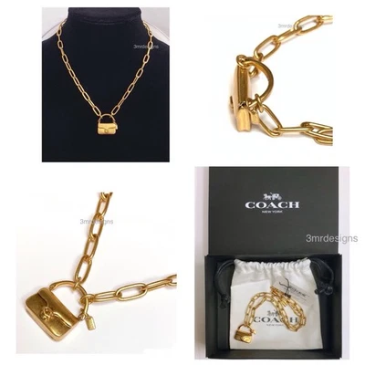 NUEVO CON ETIQUETAS Coach MINI BOLSO ATIGRADO ENCANTO Tono Dorado Latón Colgante Cadena Collar Foto 1 de 4