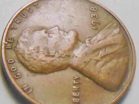 1938 P      WHEAT Cent  OBV LAMINATION  ERROR  WITH    PEEL    #GRA388P Cover