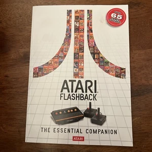 ATARI FLASHBACK ESSENTIAL COMPANION PAPERBACK GUIDE BOOK 65+ VIDEO GAMES COVERED - Picture 1 of 3