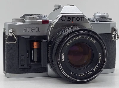 Cámara Canon AV-1 35 mm SLR con lente Canon FD 50 mm 1:1,8, funciona, tiene problemas, tal cual Foto 1 de 4