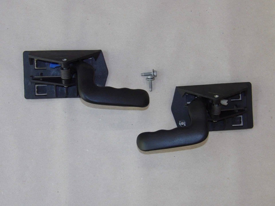 Par de manijas interiores para puertas interiores negras texturizadas Chevy Silverado Suburban Foto 1 de 3