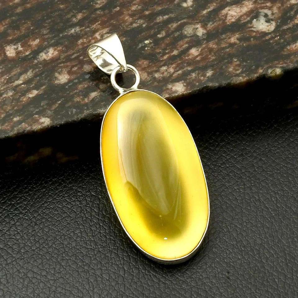 Joyería colgante étnica hecha a mano de piedras preciosas de ónix amarillo para año nuevo 2,4" AP-42121 Foto 1 de 1