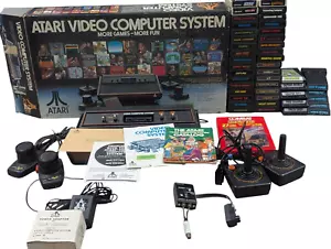 Atari 2600 4 Switch Console Bundle Box Joystick Paddles 45 Game Lot Tested 100% - Picture 1 of 20