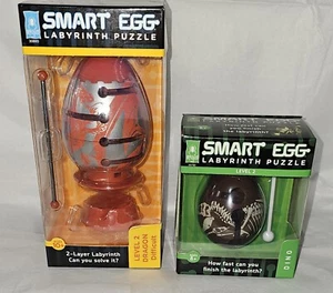 BePuzzled Smart Eggs LEVEL 2 Labyrinth Puzzles Dragon & Dino NIB 2 Puzzles! NEW - Picture 1 of 2
