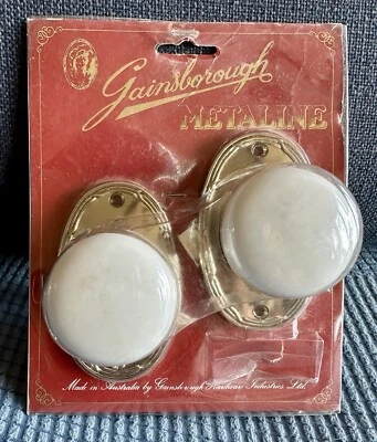 Vintage Gainsborough White Round Ceramic Door Knob Set with Gold Oval Plates - Image 1 of 4