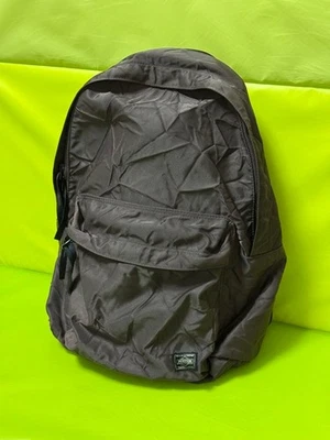 Mochila Porter de nailon marrón oscuro con 4 bolsillos usada Foto 1 de 4
