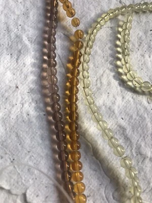 Glass Beads ~ 3 Strands ~ 4mm Round Transparent beads in Lemon, Taupe And Amber - Image 1 of 3