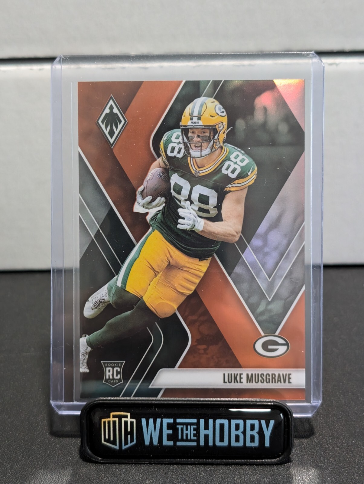 2023 Panini Phoenix - Rookies Orange #160 Luke Musgrave /99 (RC)