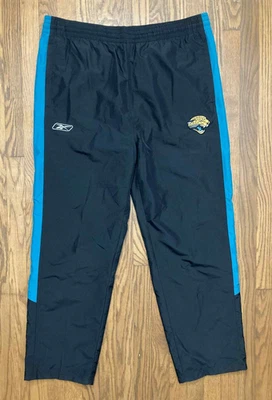 Pantalones Reebok Para Hombre L Jacksonville Jaguars NFL Pista Malla Forrada Cordón De Colección Foto 1 de 4