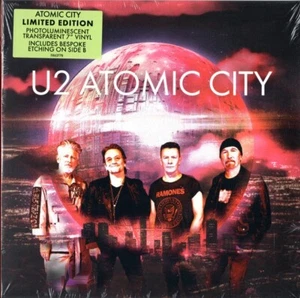 U2 ATOMIC CITY PHOTOLUMINESCENT TRANSPARENT 7" MINT - Picture 1 of 2