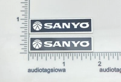Par de insignias de parrilla de altavoz Sanyo hechas a medida de aluminio Foto 1 de 4