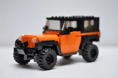 Camión Jeep Rubicon personalizado modelo naranja construido compatible con ladrillos LEGO® reales Foto 1 de 3