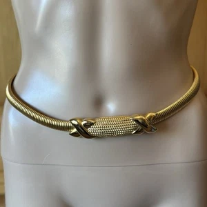 Cinturón elástico bobina serpentina tono dorado vintage años 80 hebillas cruzadas 27 29 elegante - Imagen 1 de 9