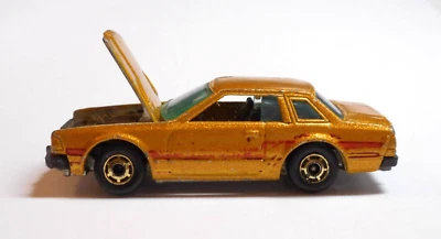Hot Wheels 1981 Metalflake Orange Datsun 200-SX con capó de apertura Foto 1 de 4