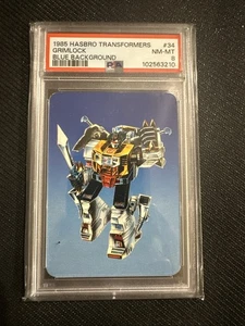 1985 Hasbro Transformers Grimlock Blue Background PSA 8 - Picture 1 of 2