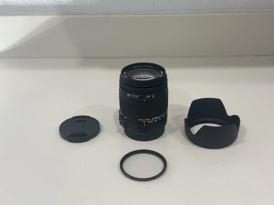 Lente zoom Sigma 18-250 mm f/3,5-6,3 DC OS HSM con capucha y filtro para Canon EF como nueva Foto 1 de 4