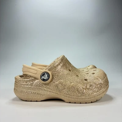 Zuecos Crocs Baya forrados con brillo dorados cálidos difusos zapatos sin cordones 207655 juveniles talla 9 Foto 1 de 4