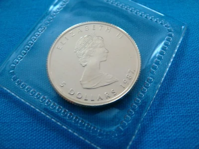 1987 1/10 унции Канада золотой кленовый лист $5 монета .9999 тонкий BU новом пластике #87ML54 - Изображение 1 из 4