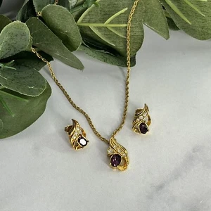 Conjunto de collar y pendientes vintage Avon imitación amatista estrás tono dorado 1995  - Imagen 1 de 9