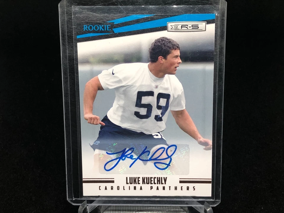 LUKE KUECHLY 2012 PANINI ROOKIES & STARS AUTO RC #D 44/499 - Image 1 of 1
