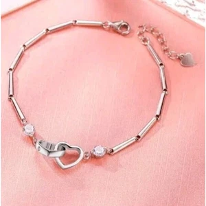 Pulsera Corazón Entrelazado Tono Plata Cristal Estrás - Imagen 1 de 8