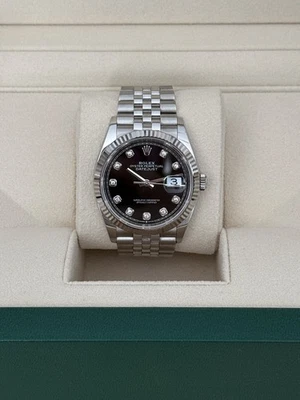 Rolex Datejust 36 esfera negra diamante acero inoxidable bisel estriado Jubilee Foto 1 de 4