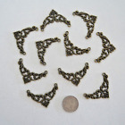 10 Brass Plated Centrepiece Charms   (m45)