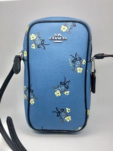 Bandolera para teléfono COACH North/South C7380 plateada/azul con cremallera con estampado floral de lazo - Imagen 1 de 10