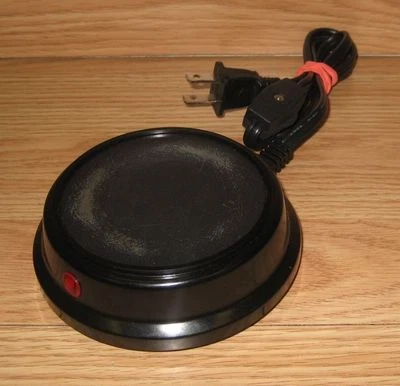 Calentador de bebidas negro redondo genuino Rival BW8M  Foto 1 de 3