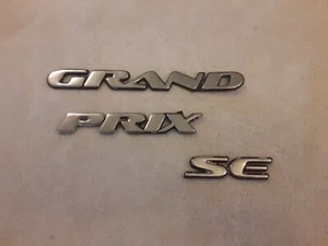 Vintage 1990s Grand Prix SE Script Emblems - Picture 1 of 4