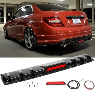 Difusor de parachoques trasero negro brillante con luz LED para Mercedes-Benz Clase C W204 Foto 1 de 4