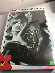 1000-teiliges Puzzle Paar mit Rose von Trefl werkseitig versiegelt - Bild 1 von 2