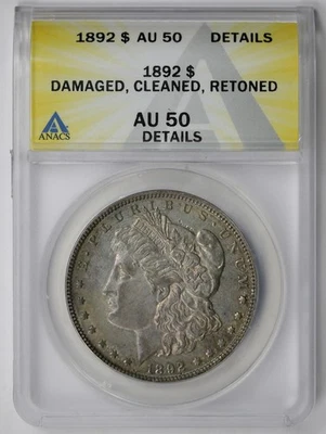 Dólar Morgan 1892 $1 AU 50 detalles dañado limpio retonizado ANACS Foto 1 de 4