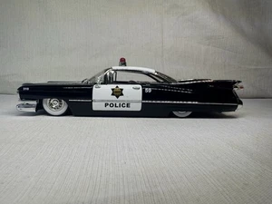 Jada Heat 1959 Cadillac Coupe de Ville Police 1:24 Diecast Modellauto #95 - Bild 1 von 16