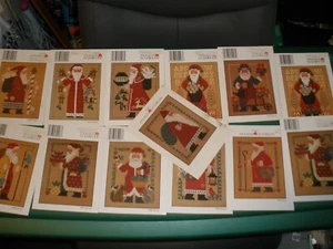 13 Prairie Schooler Santa Cross Stitch Pattern Cards (2 duplicate) 1985-1999 - Picture 1 of 5
