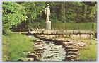 State View~Jack Daniels Statue & Spring Lynchburg Tennessee~Vintage Postcard