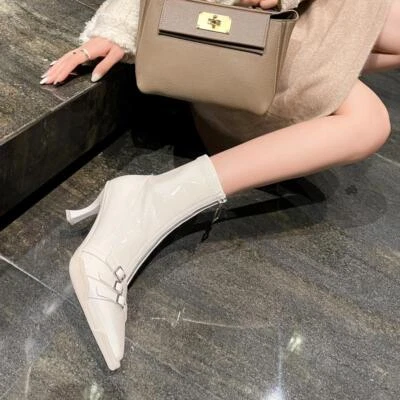 Botas de caballero informales de tacón alto con hebilla y punta de aguja hasta la rodilla para mujer Foto 1 de 4