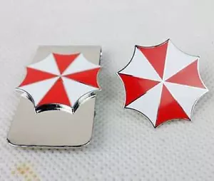 RESIDENT EVIL UMBRELLA CORPORATION EMBROIDERED LOGO METAL BADGE PIN & MONEY CLIP - Picture 1 of 3