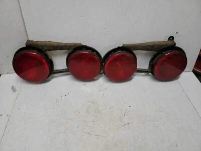 1984-1989 Chevrolet Corvette Tail Light Pair with Bezels - Image 1 of 4