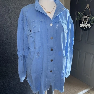 Chaqueta rasgada azul claro (L) Foto 1 de 4