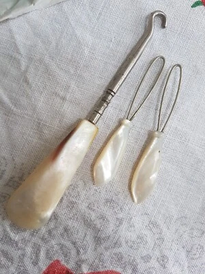 3 antique handled mother of pearl button hooks - Image 1 of 3