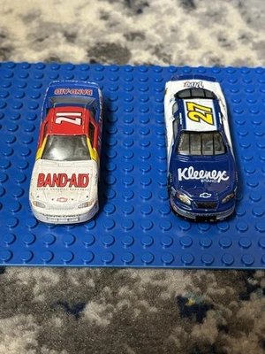 Racing Champions #21 Michael Waltrip and #27 Johnny Sauter Diecast Cars 1:64 - Image 1 of 4