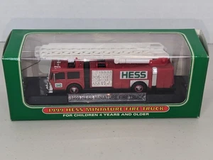 Camion dei pompieri in miniatura Hess 1999 - nuovo con scatola, camion scala rossa, giocattolo da collezione - Foto 1 di 3