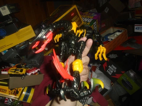 Black and Yellow Scorpion type figure Cover
