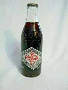 BOTELLA COMERCIAL DE COCA COLA 1908-1983 STAUNTON 75o contenido original y gorra - Imagen 1 de 4