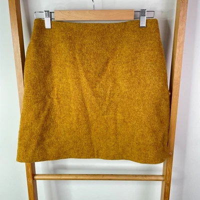 Minifalda Uniqlo para mujer 25 amarilla mostaza mezcla de lana bolsillos forrados informal Foto 1 de 4