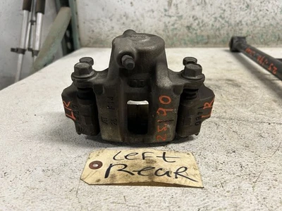 Pinza de freno trasera lado izquierdo Toyota 4 Runner 2021 fabricante de equipos originales con soporte Foto 1 de 4