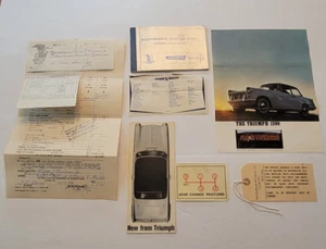 1963 TRIUMPH HERALD 1200 brochures, maintenance book, sales receipts, etc - Picture 1 of 9